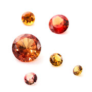 Synthetic padparadscha, round diamond cut