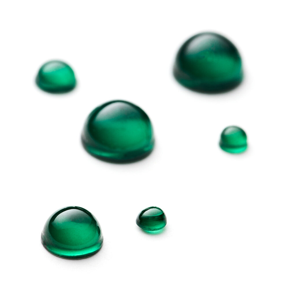 Synthetic emerald, round cabochon 