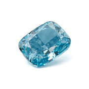 Blue treated cushion, 1,00 ct 