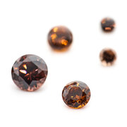 Synthetic brown cubic zirconia, round diamond cut