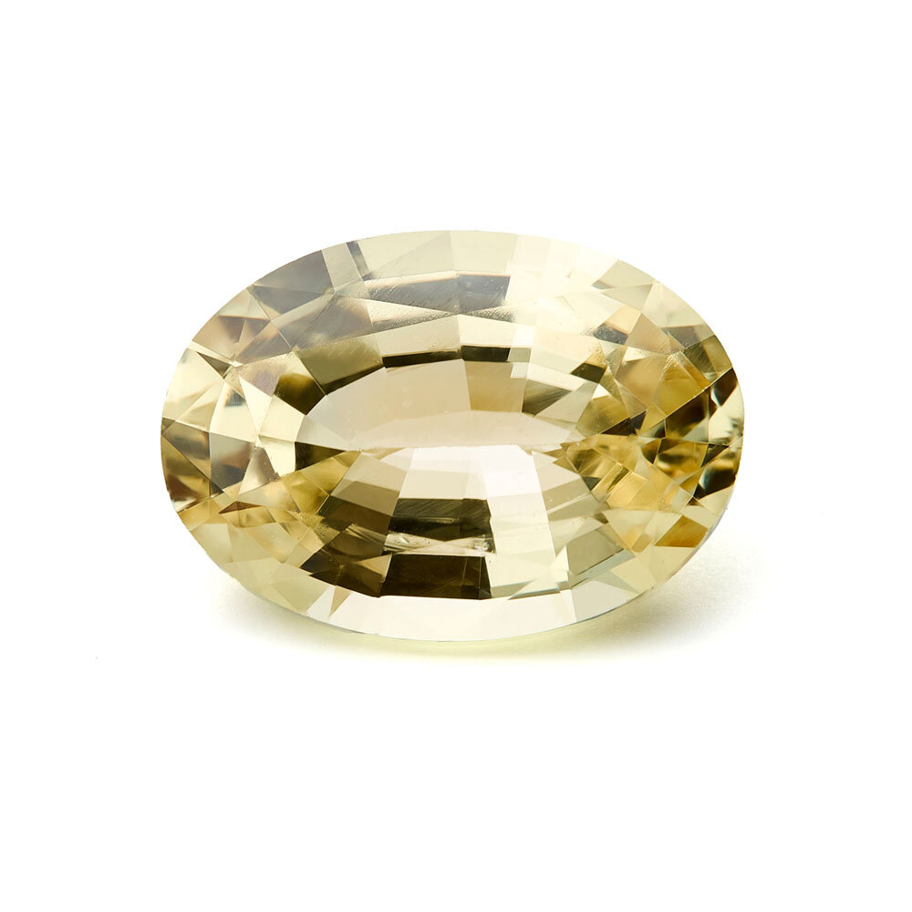 Safir, gul, oval fasett, 7,00 x 5,00 mm 