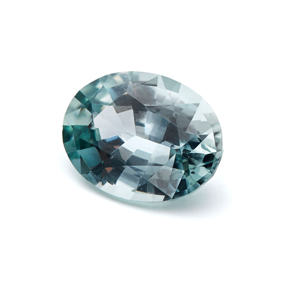 Safir, grå, oval facet, 7,00 x 5,00 mm 