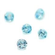 Synthetic cubic zirconia, aquamarine, round diamond cut