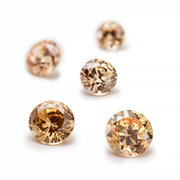Synthetic light champagne coloured cubic zirconia, round diamond cut