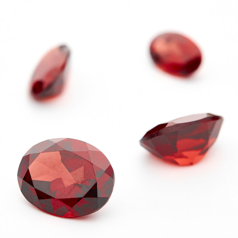 Garnet, oval diamond cut 