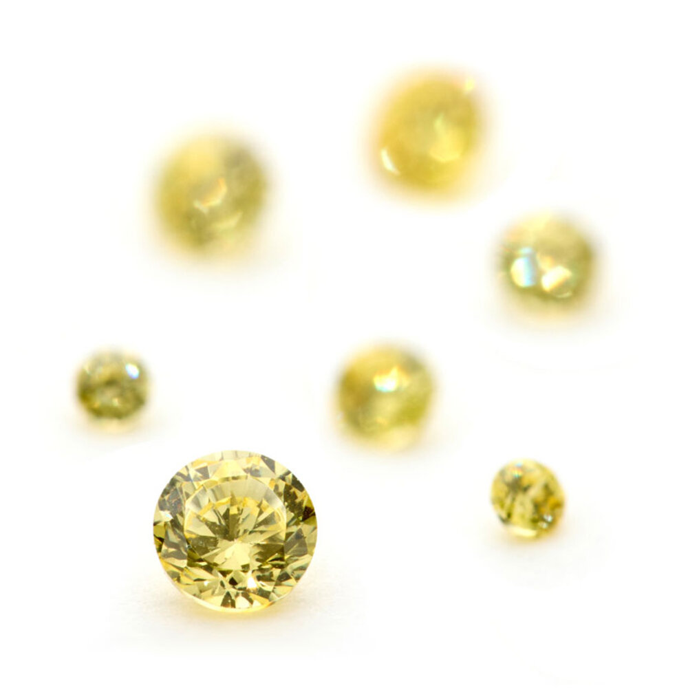 Synthetic yellow cubic zirconia, round diamond cut 