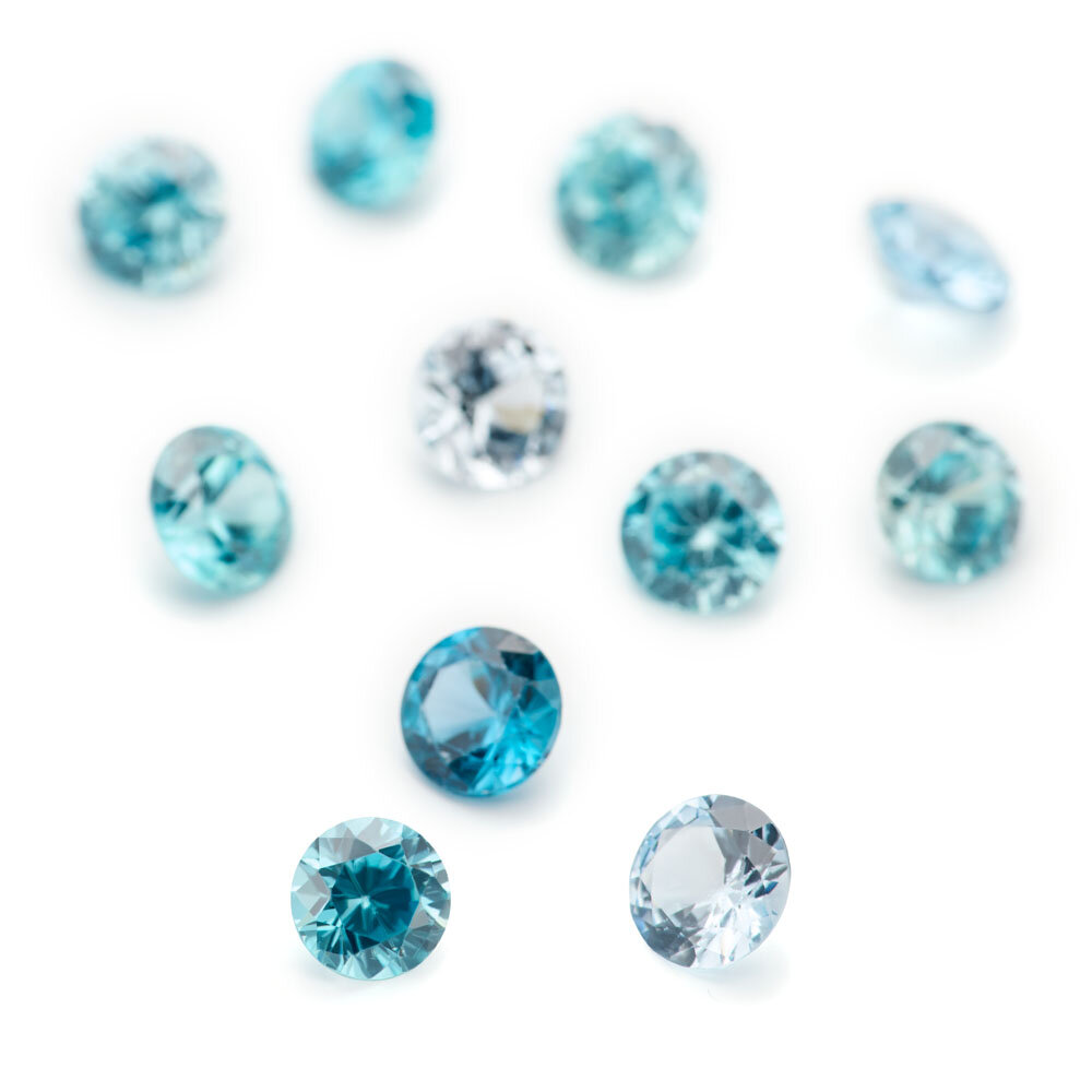 Synthetic aquamarine, round diamond cut 