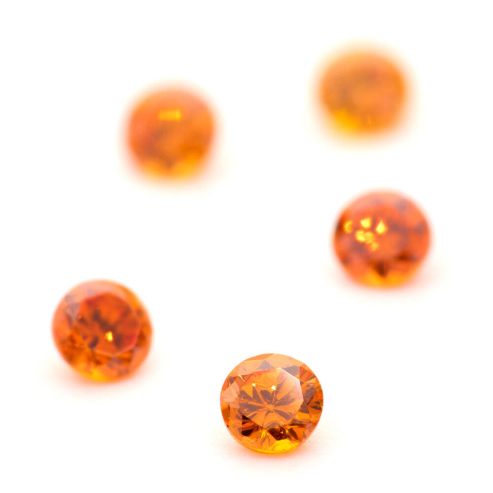 Synthetic orange cubic zirconia, round diamond cut 