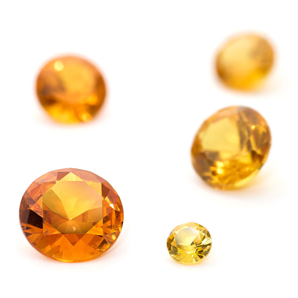 Synthetic danburite, round diamond cut 