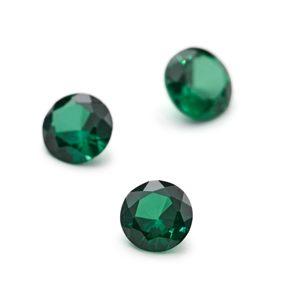Synthetic emerald, round diamond cut 