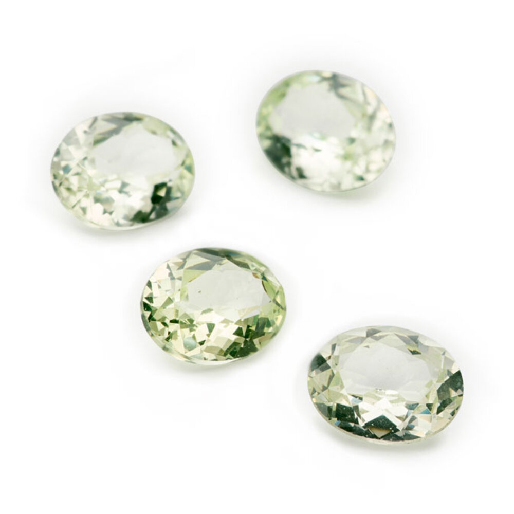 Synthetic chrysolite, oval diamond cut 