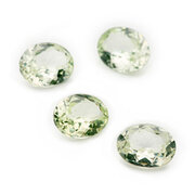 Synthetic chrysolite, oval diamond cut