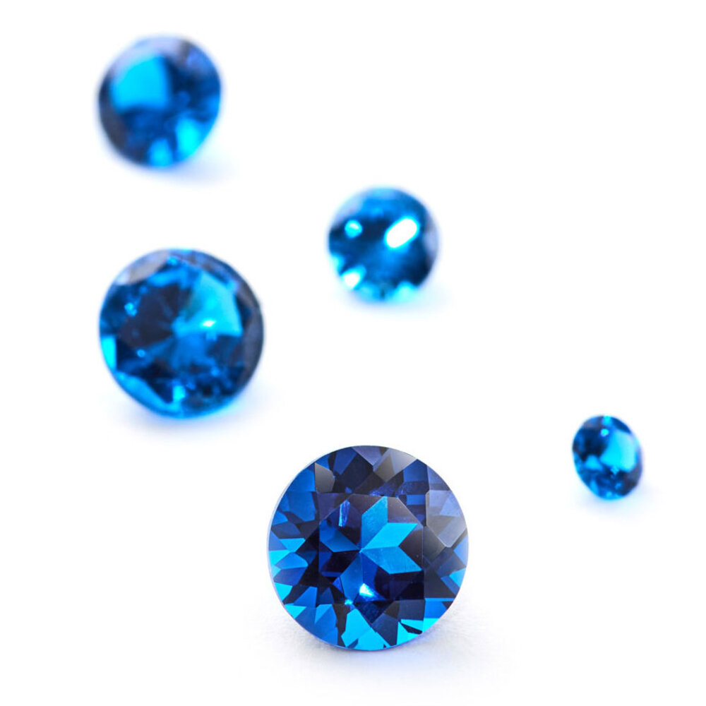 Synthetic blue spinel, round diamond cut 