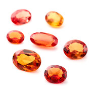 Synthetic padparadscha, oval diamond cut