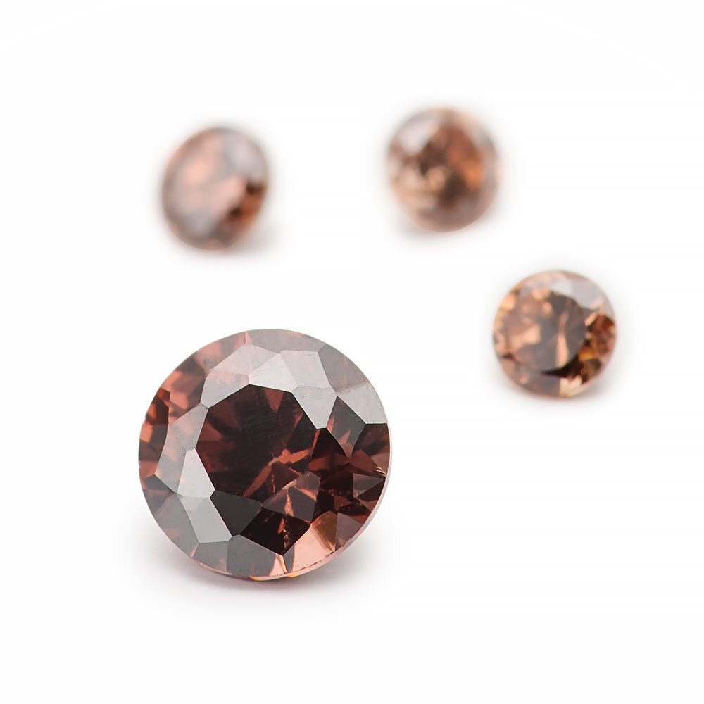 Synthetic brown cubic zirconia, round diamond cut 