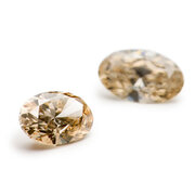 Oval Natural Light Brown +/- 0.50 ct